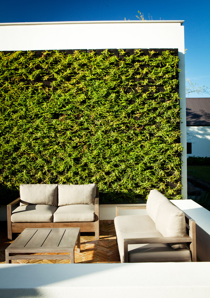 The outdoor furniture is from Calligaris in Italy. The Pink Geranium design and landscape company from Paarl were responsible for the landscaping and the green walls. 
 
