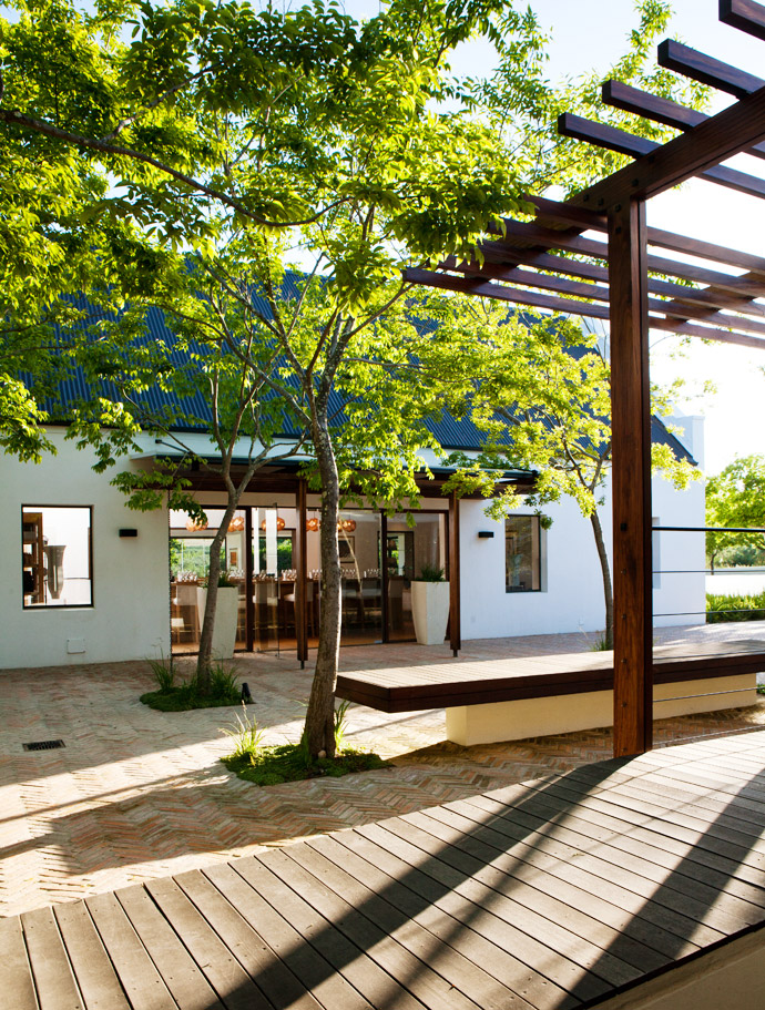 Glass stack doors open up the tasting venue to the courtyard. 