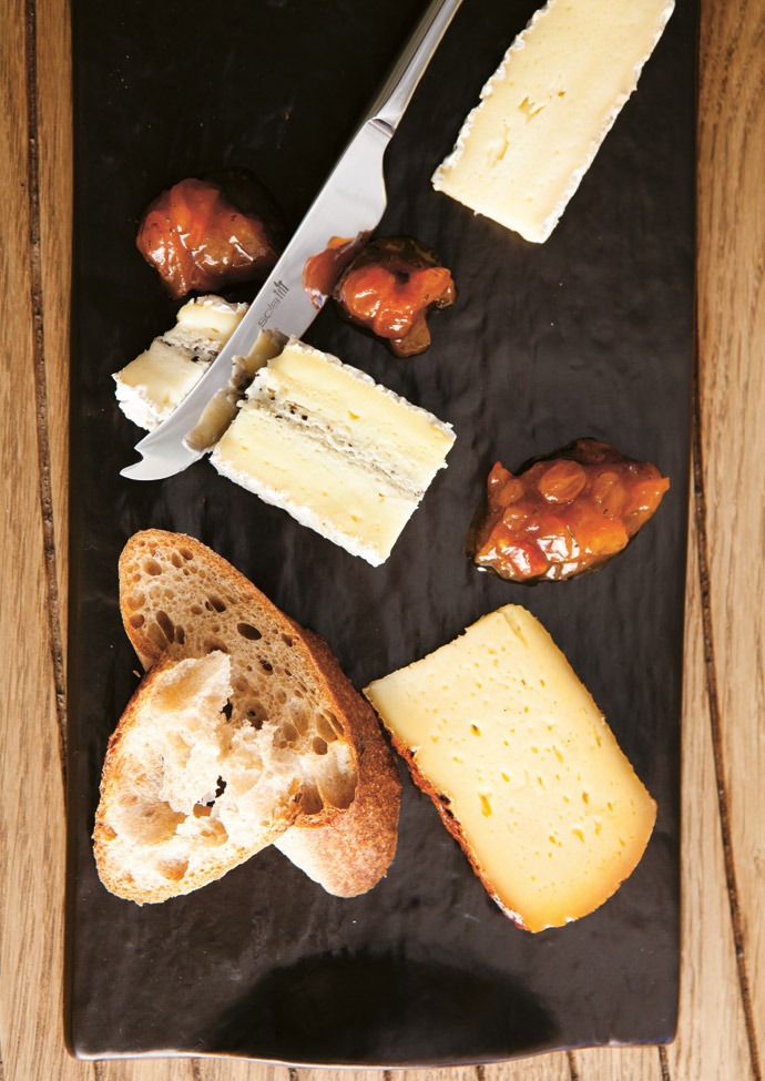 The imported Rothschild Fromage Selection available for tasting includes three cheeses, a fresh baguette and other delicacies.  
