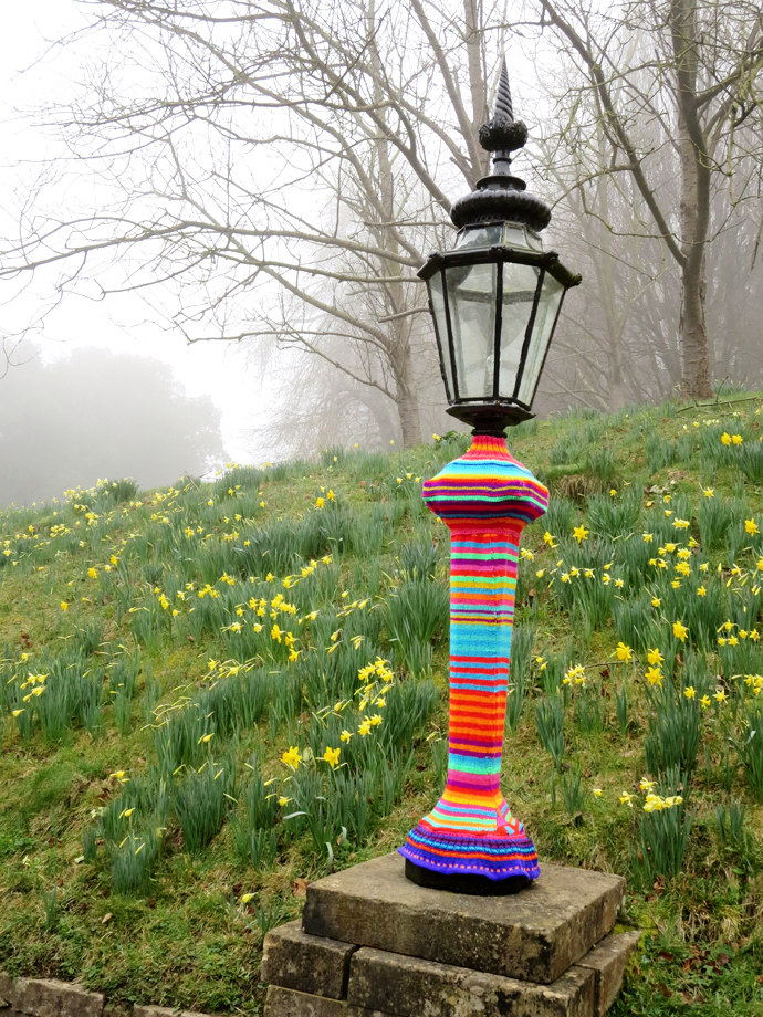 Starting the exhibition outside the museum already, making a spectacular entrance, Johan and Kaffe yarnbombed a giant yew tree and surrounding lampposts with bright knits, fabrics and pom-poms. 