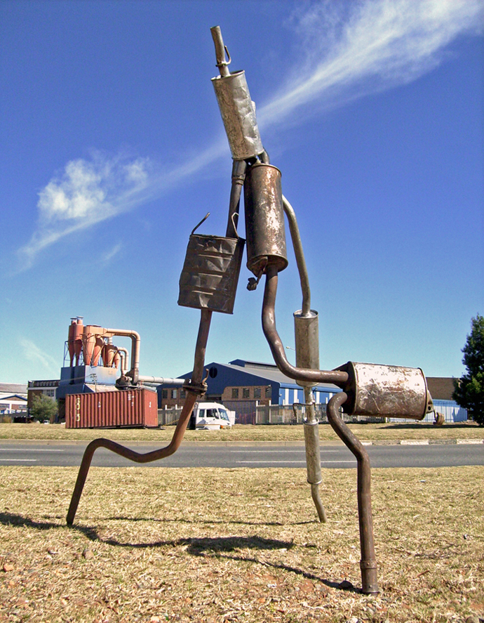DIY signage for informal exhaust pipe repairs.