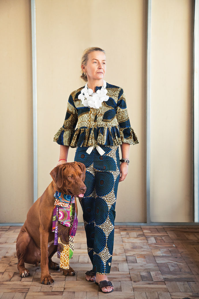 Jennifer is wearing a ruffle-detail top, R1 500, drawcord pants, R1 200, and an organdie-and-seedbead flower necklace, R500. Leo’s collar is made to order.