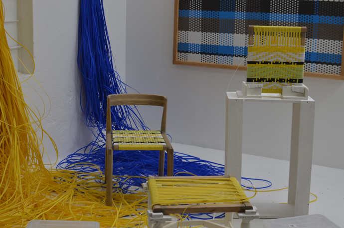 Woven panel and chair by John Vogel. The weavers, below from left, are Lizelle Andrews, Tishina Watson and Charnielle Davids. Image credit: Tracy Lynch.