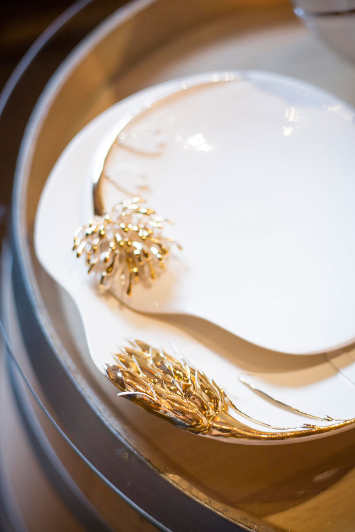 Elsje Burger, Protea and High gold Leucadendron plates, stoneware and 9ct gold, slipcast and handwork