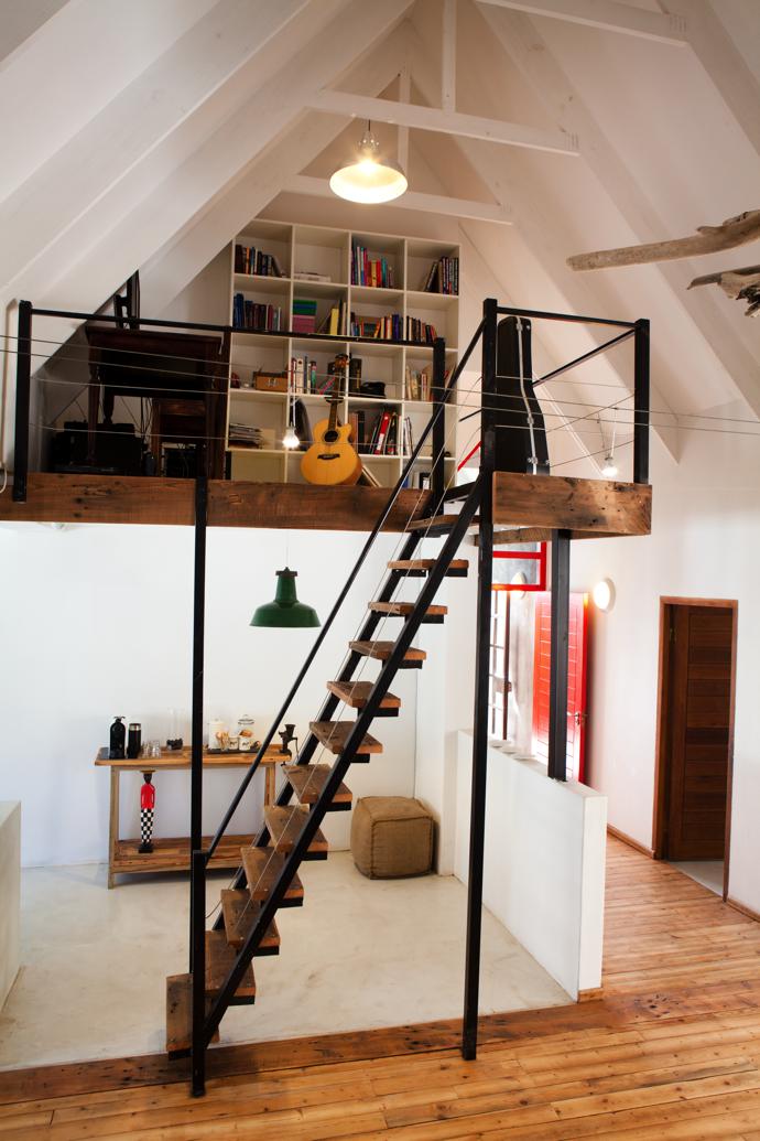 The mezzanine level makes the perfect study nook. 

