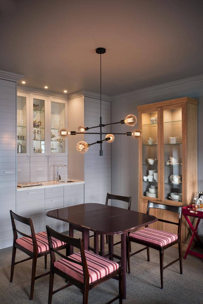 The decision to extend the kitchen wall meant that essential space was provided to fit in cupboards, housing within them a full standard kitchen’s functions and much-needed counter space.