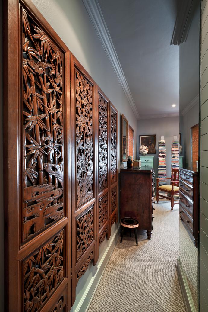 The screen was awkward standing on the floor, says Astrid, so she hung it on the wall in a blank passage and created what they now call the “camphor corridor”. She loves the thought of Lesley being reminded of her childhood every time she walks down the passage.