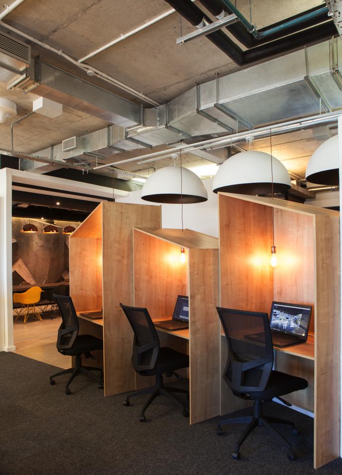 These innovative hot desks were designed and made by Pure Design. The lights are by K. Light.