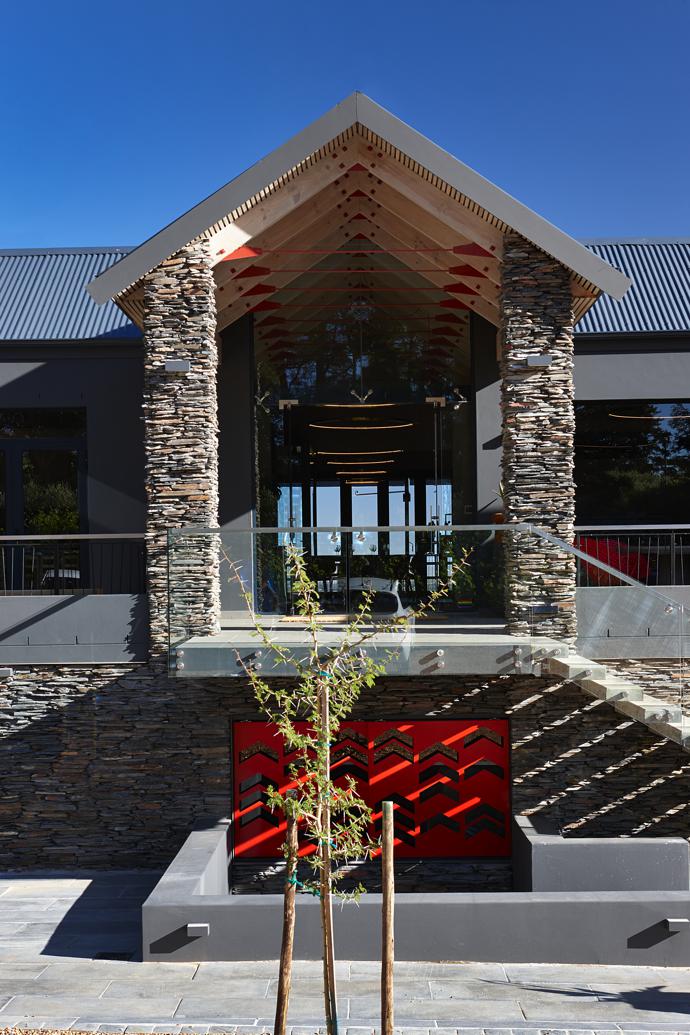 Grey Table Mountain slate cladding adds texture and aesthetic appeal to the main entrance.