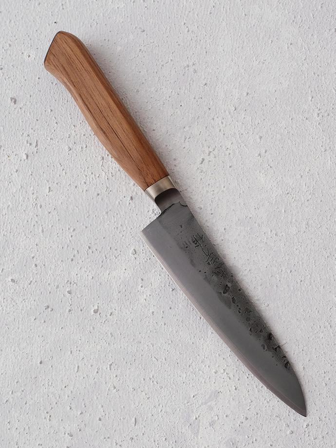 Petty Knife (125 mm) by Tadafusa, R1 500. Petty (paring) knife with 125 mm blue paper steel blade with a laminated stainless outer. The blade finish is called 
