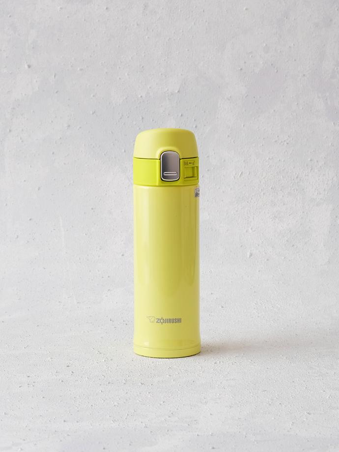 300ml Stainless Vacuum Flask (Lime Yellow) by Zojirushi, R450. 300 ml stainless steel vacuum flask for hot or cold beverages, with one hand touch open and lock mechanism. It has a 3 cm wide mouth for easy drinking. It maintains hot liquids at 85°C for one hour and at 69°C for up to six hours, and cold liquids at 9°C for up to six hours. Zojirushi was established in 1918 and is known as Japan's famous 