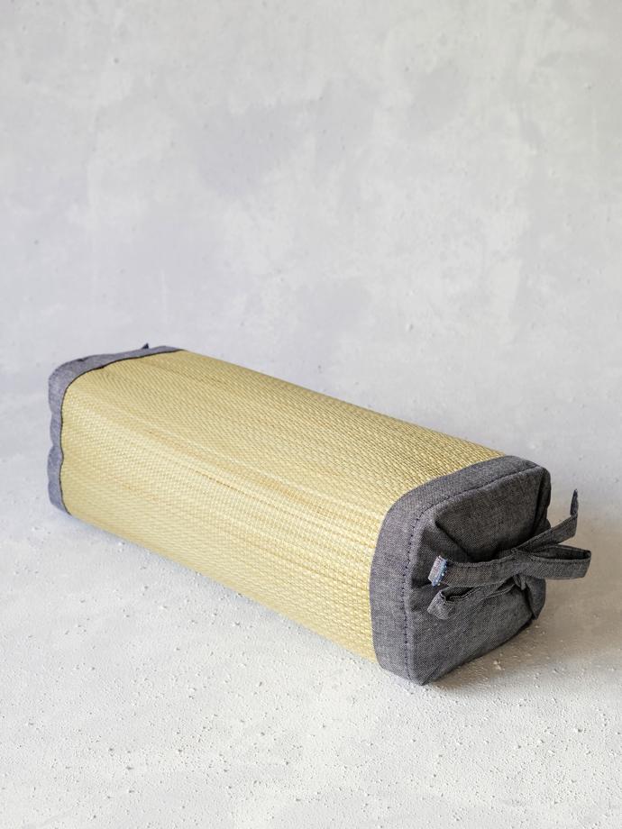 Tatami box cushion by Ikehiko, R480. This tatami box cushion is made by Ikehiko Corporation, established in 1886. It is made of natural Japanese igusa rush, the same as used to make traditional tatami mats. Igusa has a natural, grassy fragrance and acts as a deodorizer, while being very moisture absorbent. The cushion edges are made from blue denim.