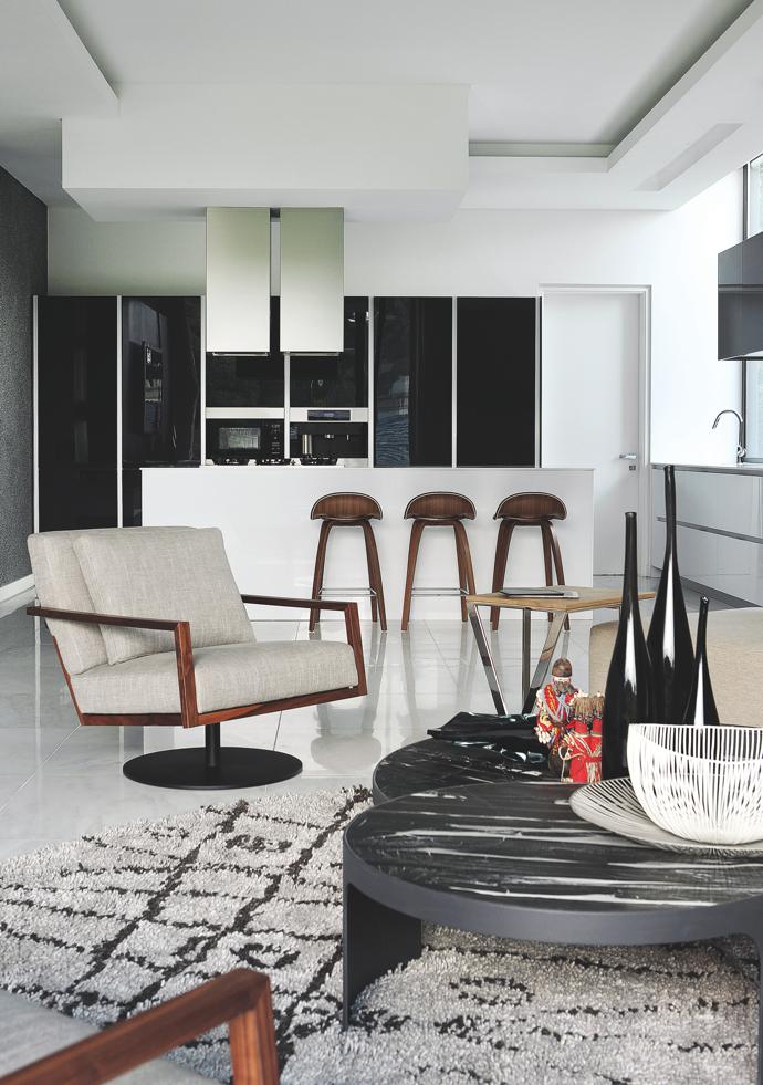 The clean lines of the carefully designed kitchen mean it fits perfectly with the home's modern, designer aesthetic. 