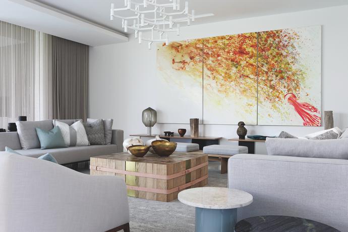 A triptych by South African artist Penny Siopis graces one of the walls in the formal lounge. 