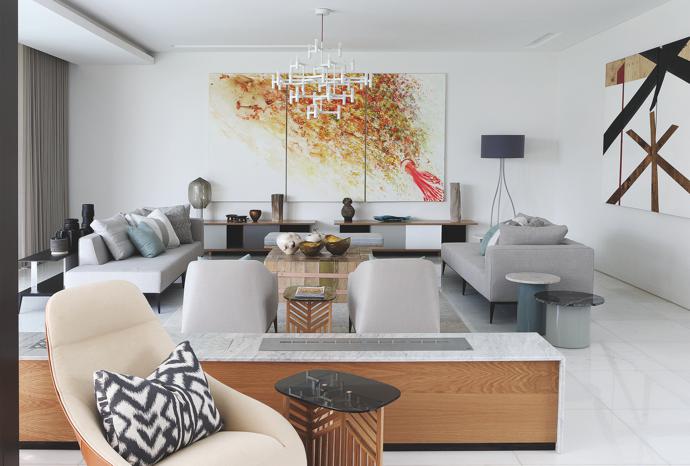 Easy-living elegance is captured in the clean lines of OKHA’s furniture pieces in the formal lounge. The She Standing lamp is from OKHA and the Crown Major chandelier from Nemo Lighting.