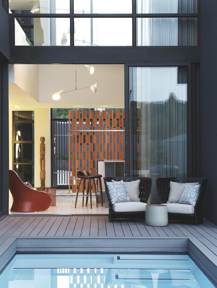 The garden, deck and splash pool offer different areas for entertaining, dining, lounging and grilling.