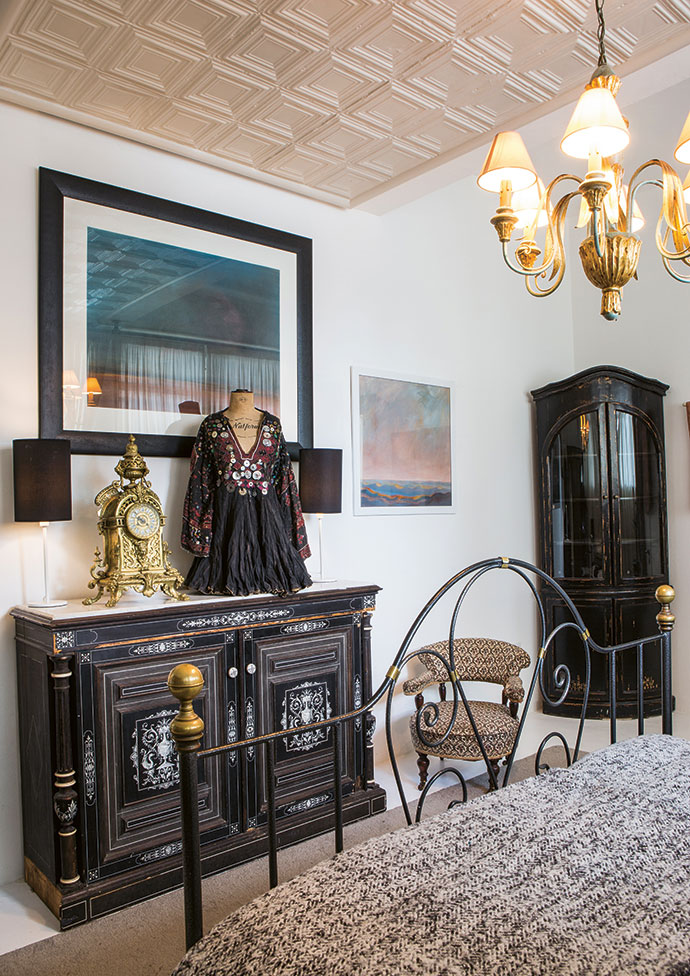The beautiful dresser, of German
origin, was salvaged from Rossend
Castle in Fife, Scotland, and the
19th-century French solid brass
clock came from a shop in Pretoria.
An anonymous benefactor donated
the Middle Eastern Bedouin dress
on a 1920s Stockton bust to Cecile’s
vintage shop. The picture of the
Namib Desert is by artist Colin Steyn.