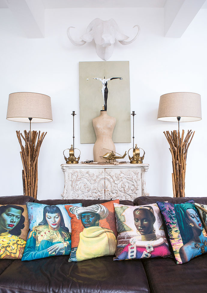 On top of the Baroque dresser stands an original 1920s Harrods dressmaking dummy and on either side of it two crowns, possibly of Indian
origin, that were once shop props in Cecile’s vintage shop, ThreadBARE, in Edinburgh. The painting is Brian’s own work and the Tretchikoff cushions are from Baraka Gifts & Decor in Green Point.