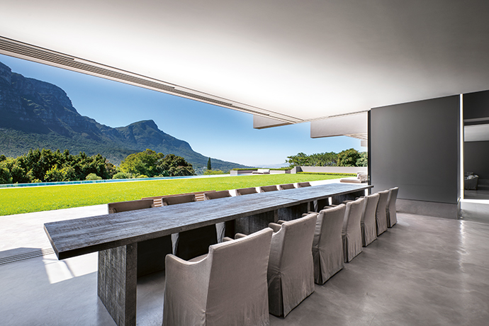 The 16-seater table and chairs were imported from the US, and are the setting for languid lunches with family and friends.