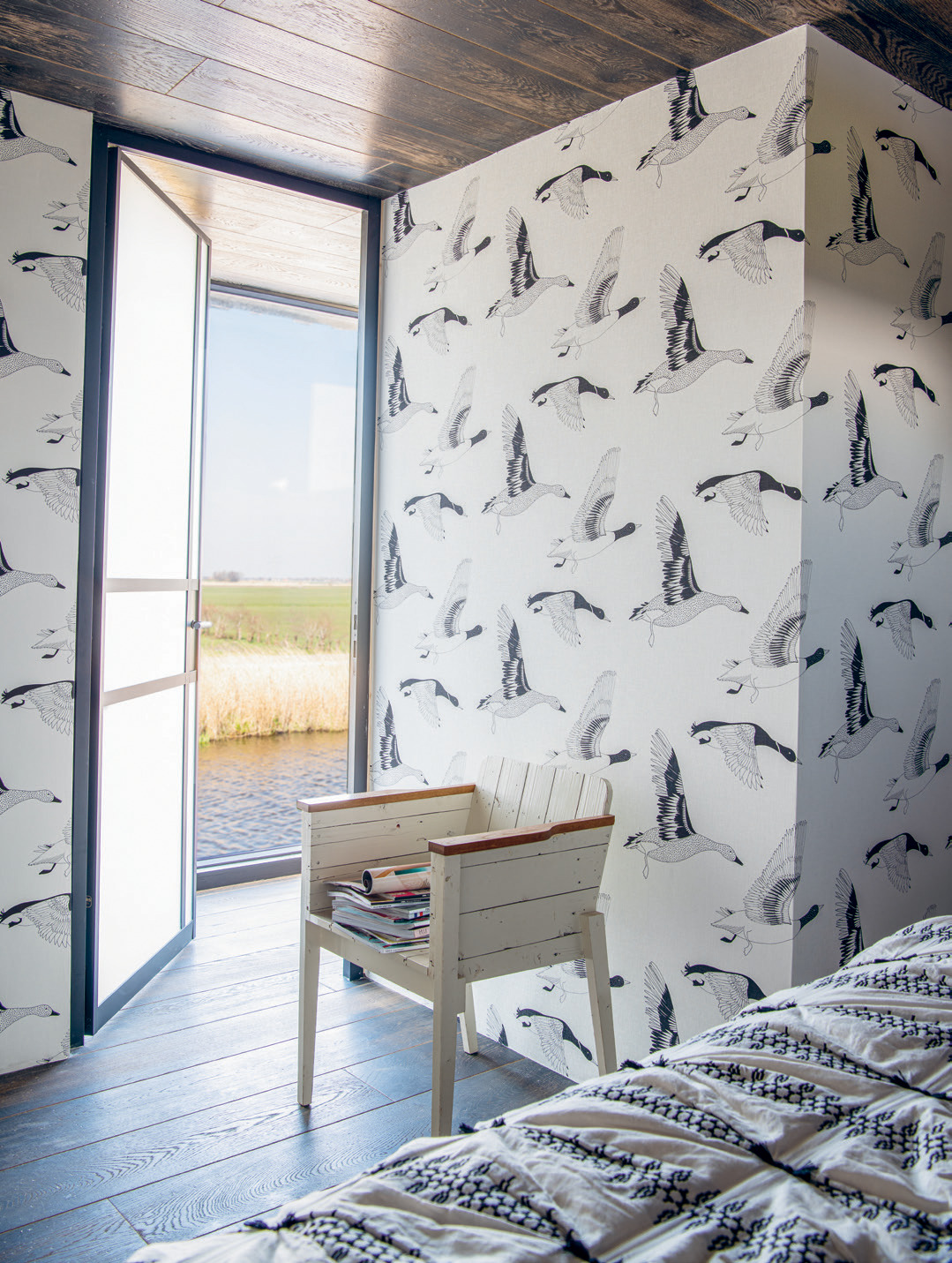 A Piet Hein Eek chair allows its occupant to take a breather.