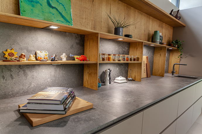 A down to earth farm feel modern kitchen with select inserts for each working station. From bread cutting to spice selection.
