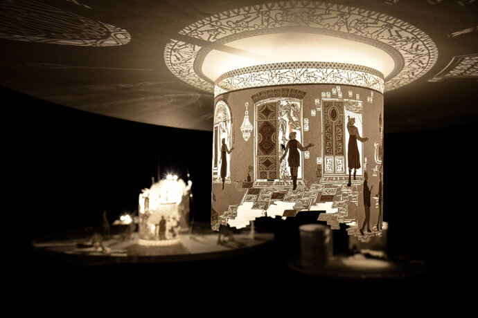 “THE STORYTELLER, THE LISTENER, AND OUR STORY” (2021), paper and light Installation