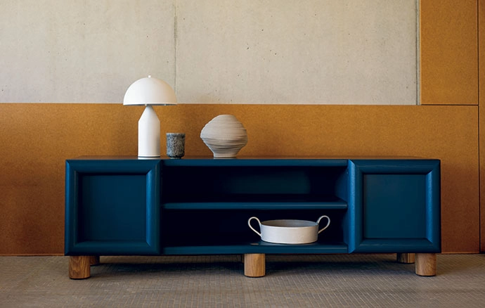 The Roly-Poly server/media unit (pictured here in Blazing Blue) is designed in modules, and can be arranged in various combinations of drawers, doors and open shelving.