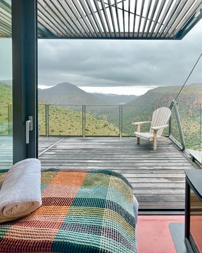 The bedrooms have double-glazed sliding doors, and include fi ttings such as Pedersen + Lennard’s Stockholm wall hooks, Hoi P’loy’s Signature Swivel wall sconce, and Mungo’s bed linen and throws.