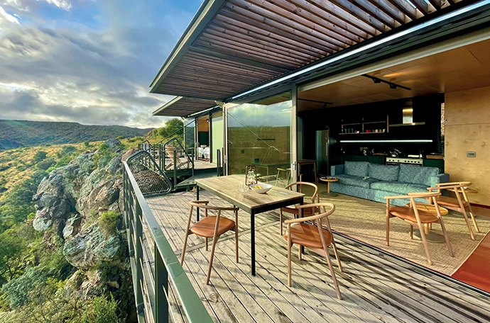 The deck features chairs from James Mudge’s Hardwood range, and a table from Pedersen + Lennard’s KPA range.