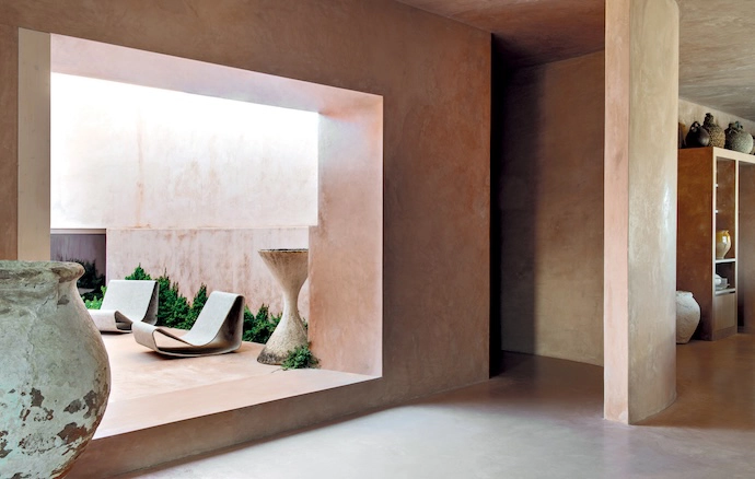 The kitchen opens onto an adjoining terrace.