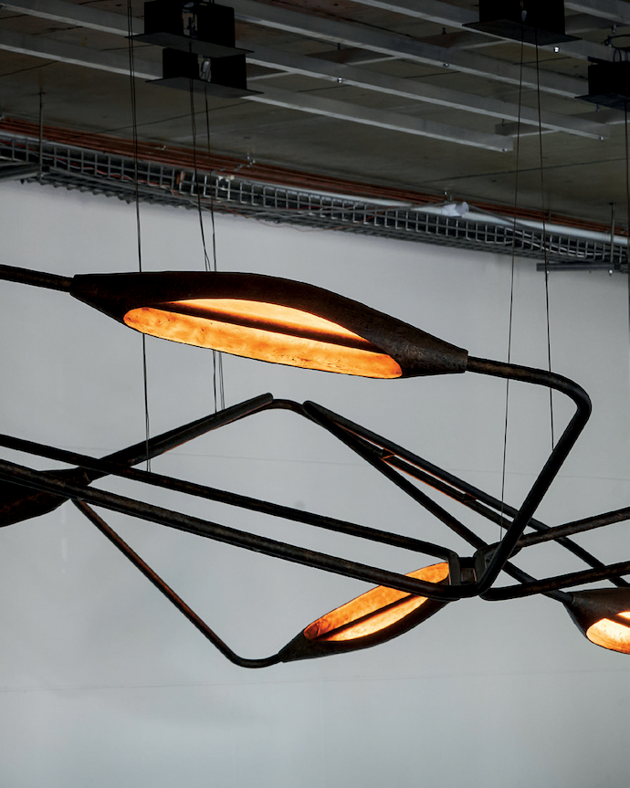 The bronze Amphora, a feature light by One to One, is inspired by nature.