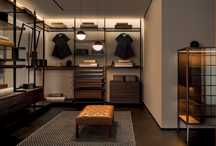 A statement pendant, back-glow and integrated lighting create harmony and balance at the Domum 
showroom.