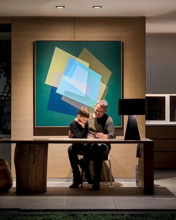 The office lamp at Project Beyond is designed to conceal the light source while fully illuminating the work surface.