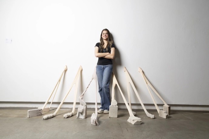 Sarah Volker - Gqeberha, Taut, tethered and torn (Ballet tights, stones and cement blocks)