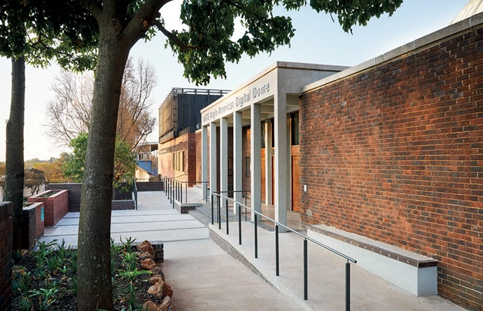 A ramp leads to the dome entrance, ensuring universal access.