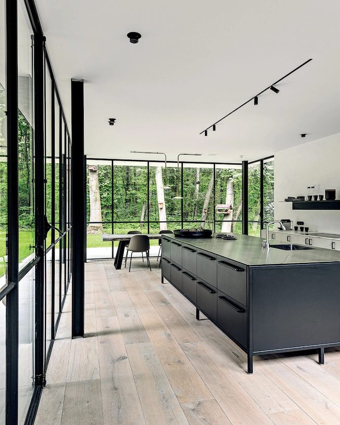 The lighting above the dining table is by Fien Muller of Muller Van Severen.