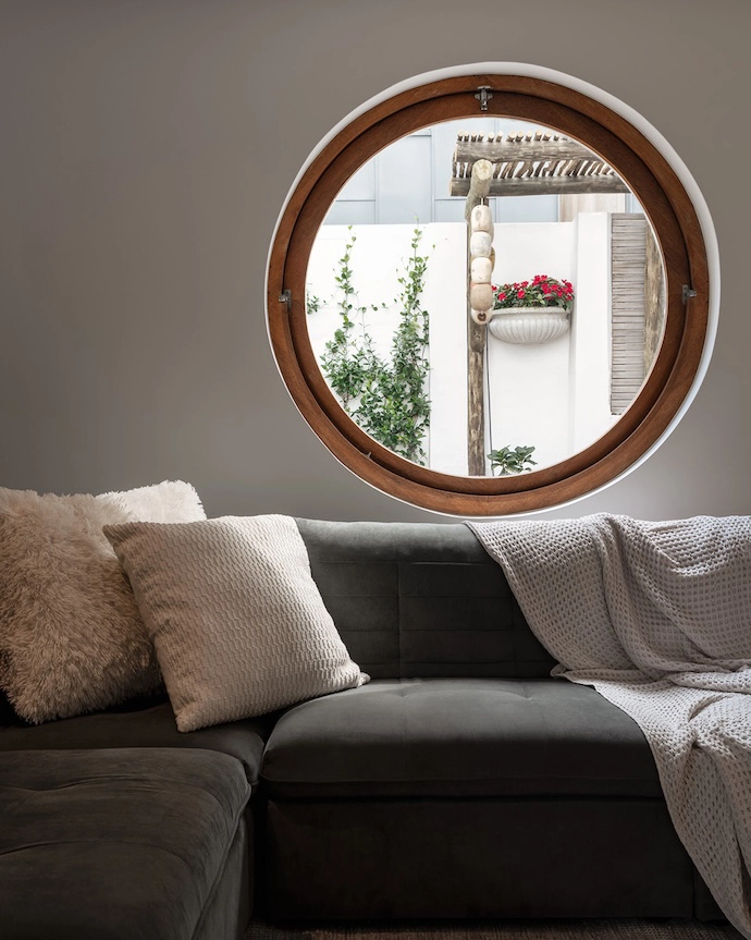 Portal windows make a quirky maritime nod here and there, while form follows function in the clean-lined main and guest bathrooms, with sanitaryware by Duravit and Crestial.