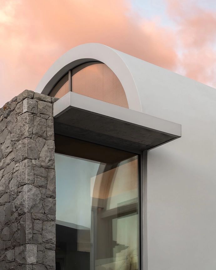 The juxtaposition of curves and right angles is consistent inside and out.