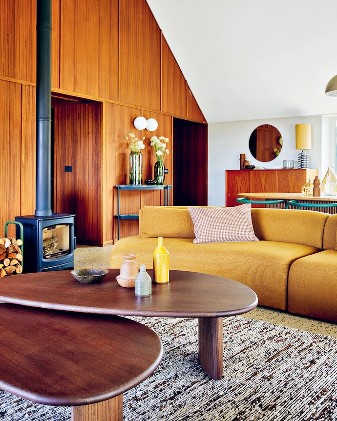 The timber panelled wall was created by local woodworkers from Kia-Ora.