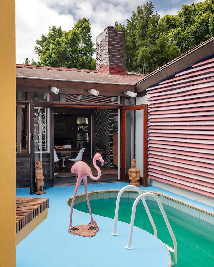 What the pool flamingo says, goes – hence the colour-matched horizontal louvre cladding. 