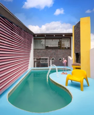 With a replica Garden Party chair by Luigi Colani for Heinz Essmann in the mix, the kidney-shaped pool and surrounding entertainment area recently received a 1970s Miami makeover.