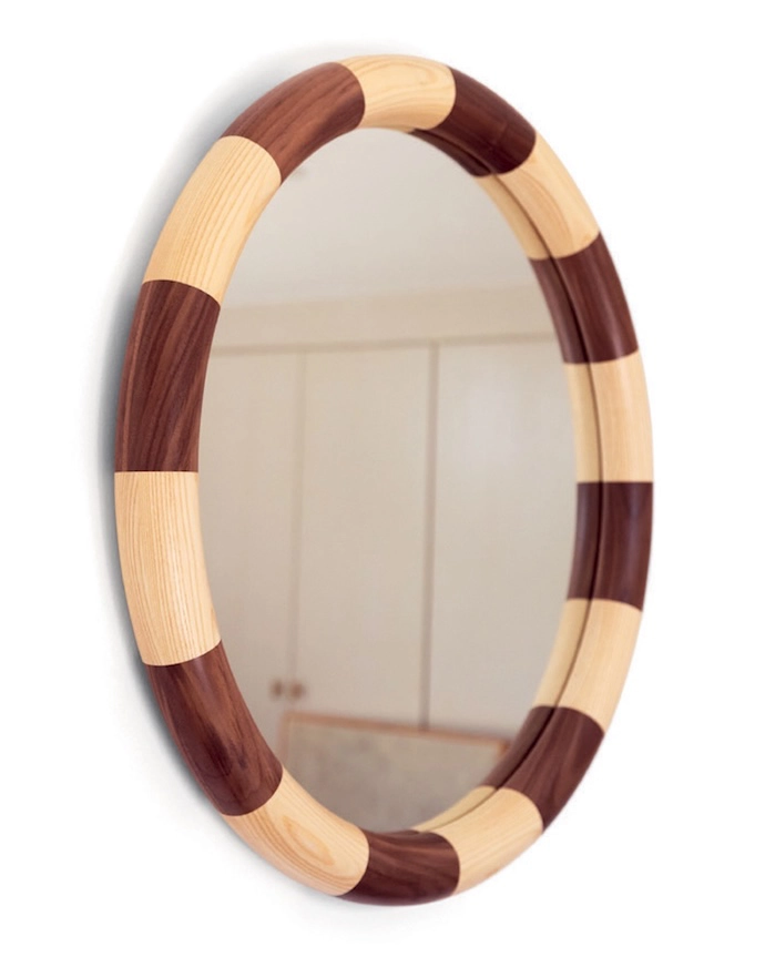 Round mirror in Walnut.