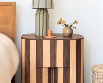 Bedside table in Walnut.