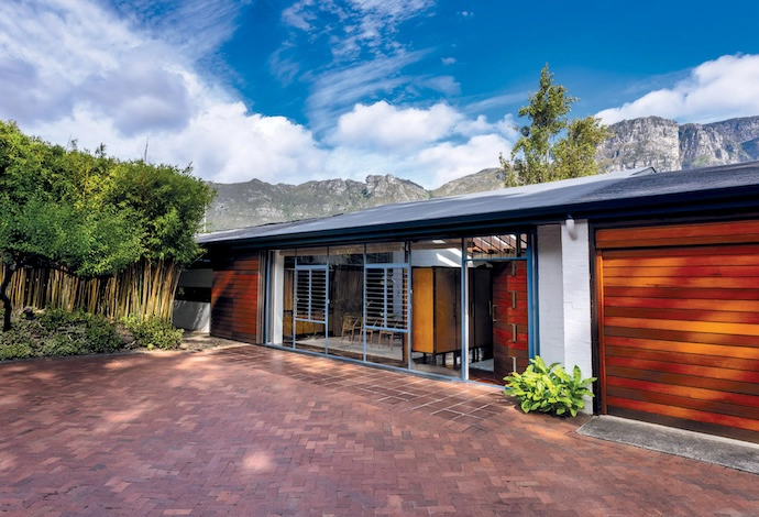 Keurbos’s entrance – note the beautiful bespoke front door with large brass hinges, again designed by the architect.