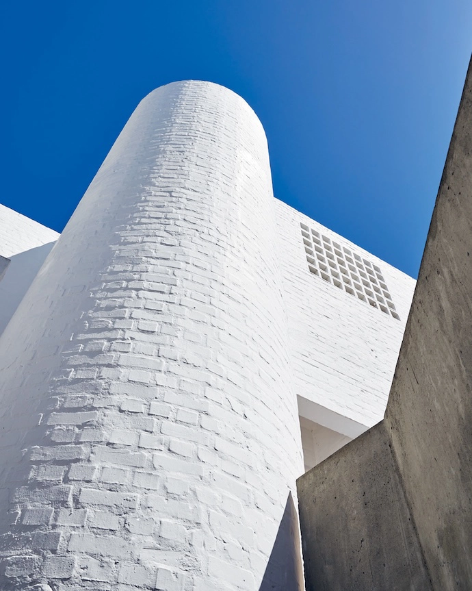 Unbeknown to passers-by, the cylindrical projection contains the home’s stairwell.