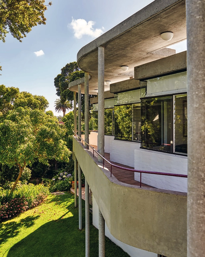 Arranged in step formation, the four identically sized rooms next to the main bedroom each have access to the balcony and the external spiral staircase.