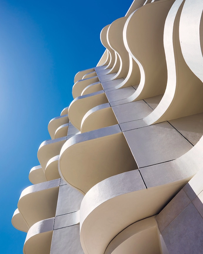 The Cole hotel’s asymmetrical balconies that overhang the property’s boundaries (with the required permission, of course). They’re described as “Baroque operatic” by the architect, Robert Silke.