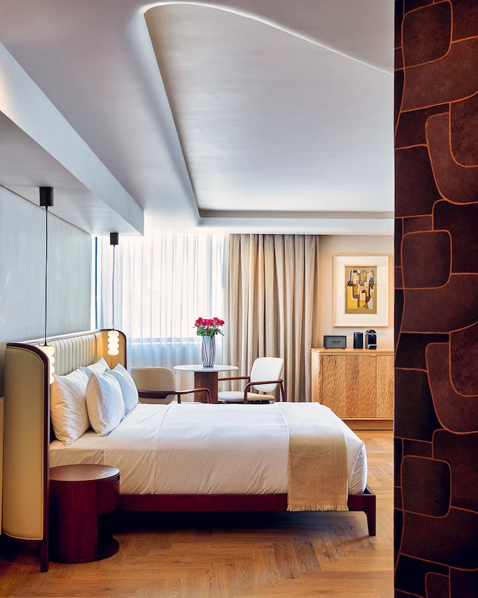 A main bedroom in one of The Cole’s Sea-facing Suites. All furniture in the hotel was designed by Paul Kovensky with the InHouse team, and custom-made for The Cole by Hermon Brink.