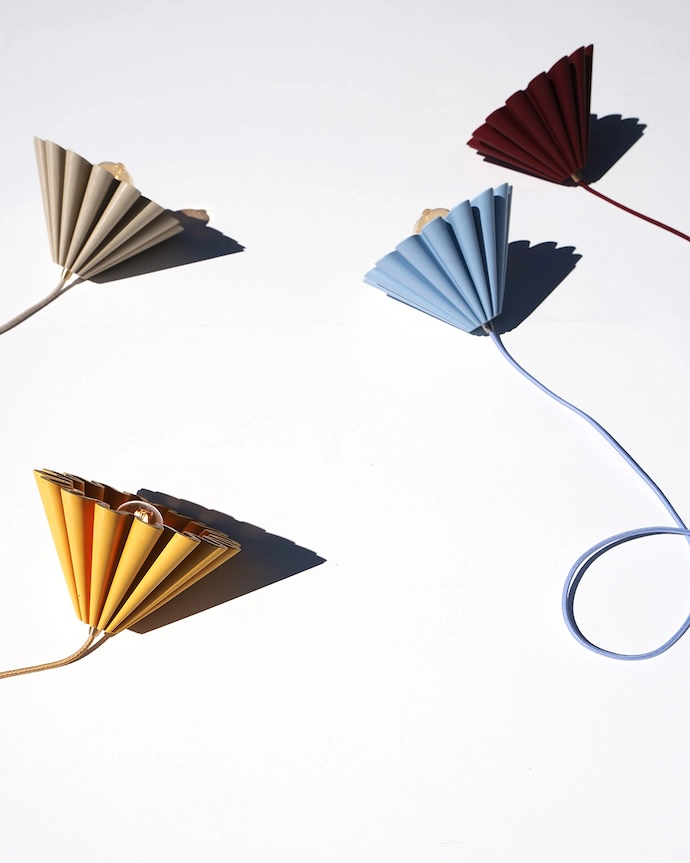 The Gathered pendant is available in four colourways: Sandstone, Harvest, Maroon and Powder Blue.
