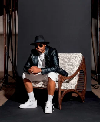Khwebula Arts founder Sipho Khwebula Twala in the Gama occasional chair.